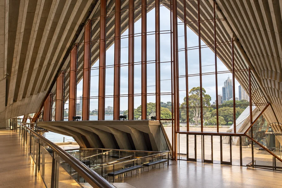 Concrete shell ribs and tall glass walls in the Sydney Opera House foyer