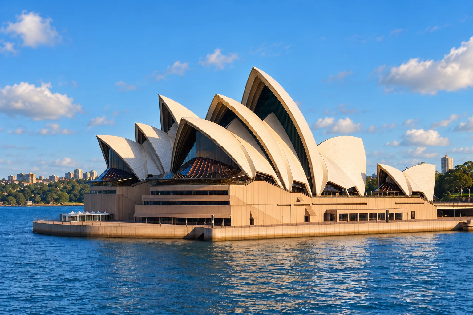 Sydney Opera House sails overlooking Sydney Harbour in soft morning light